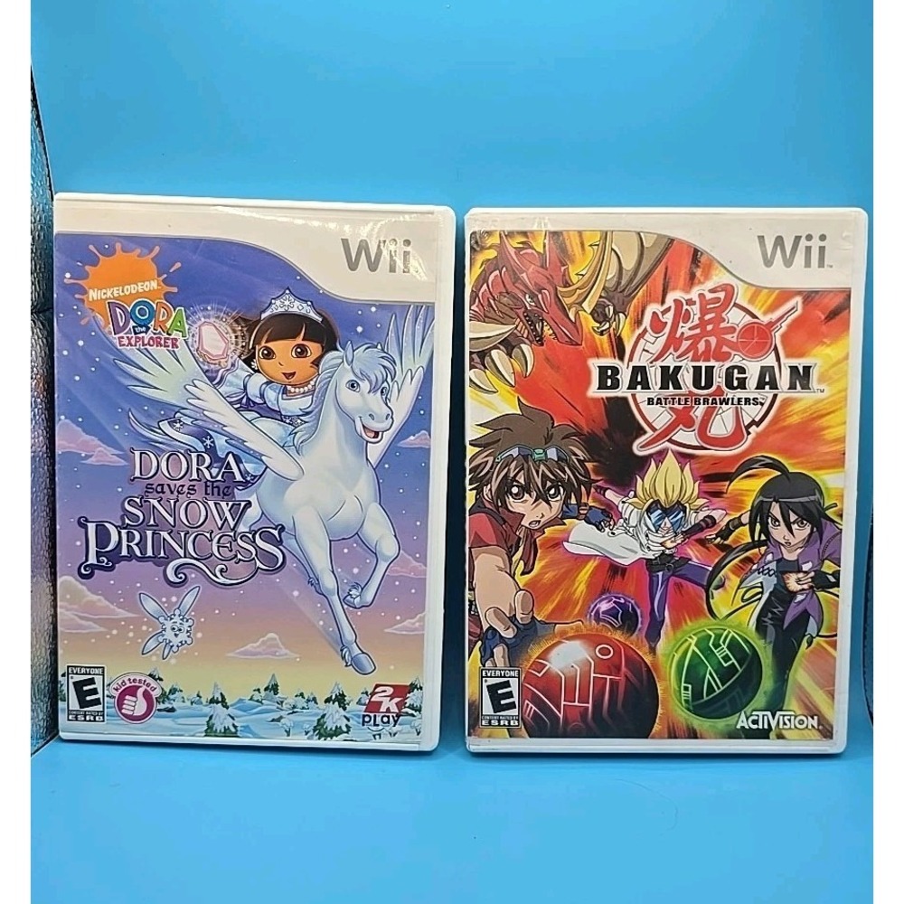 Set Of  Two Wii Games: Dora Saves The Snow Princess,‎ Bakugan Battle Brawlers